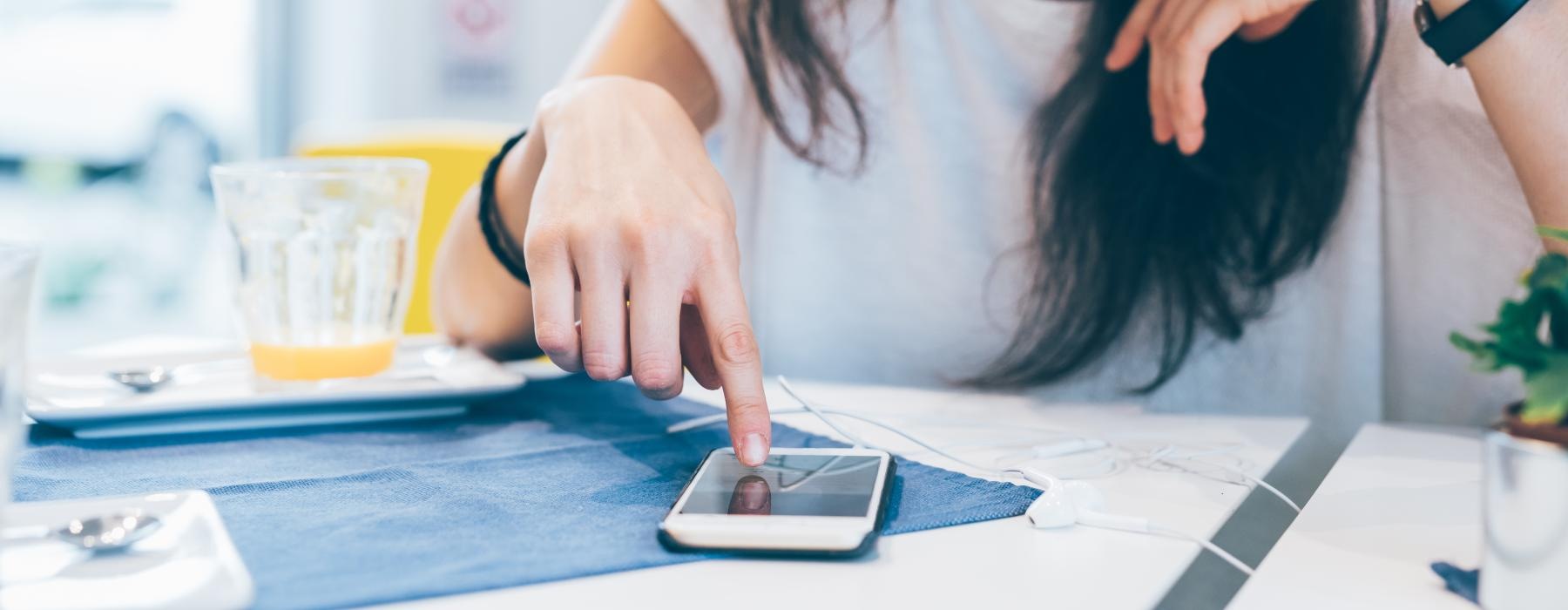 a woman sitting at a table
